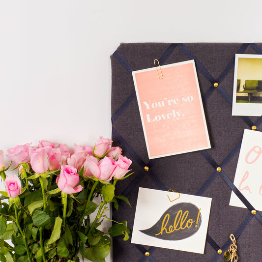 Close-up of grosgrain ribbon and stud detail on Charcoal notice board
