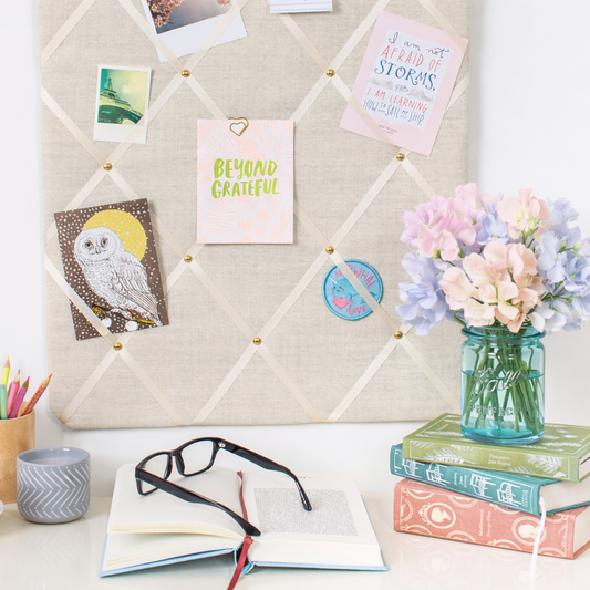 Close-up of grosgrain ribbon and stud detail on Ivory notice board