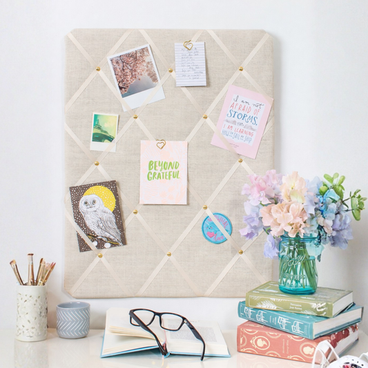 Ivory fabric notice board with ribbon detail

