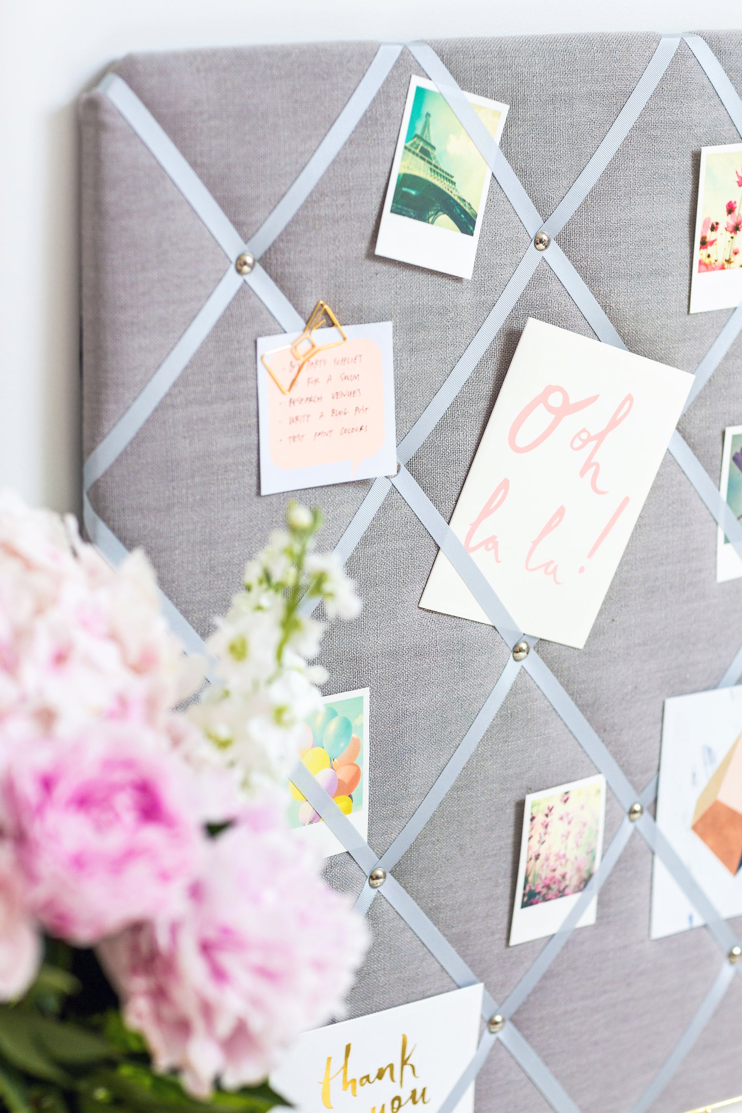 Close-up of grosgrain ribbon and stud detail on Scandi Grey notice board
