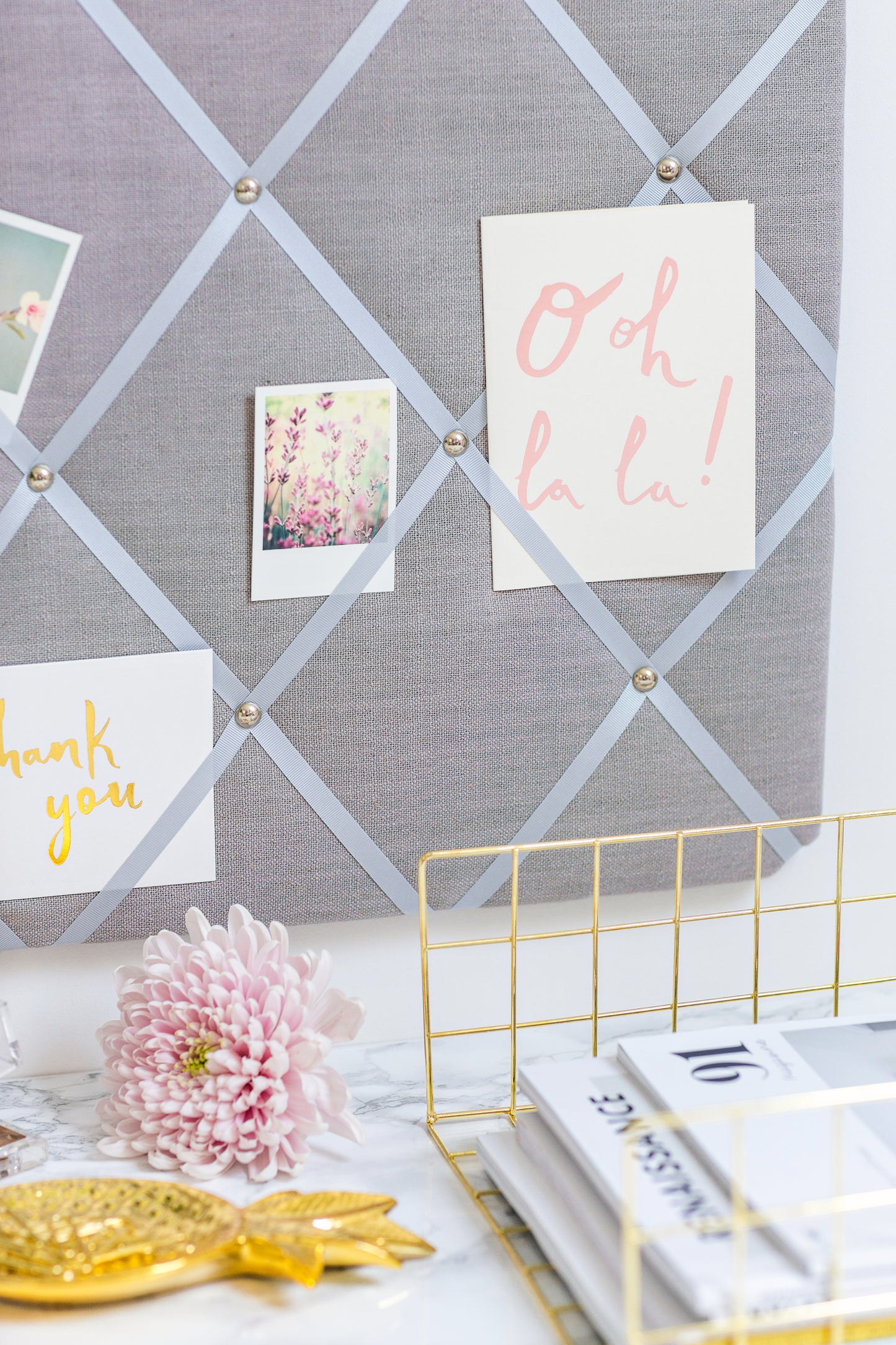 Scandi Grey fabric notice board holding notes and photos without pins
